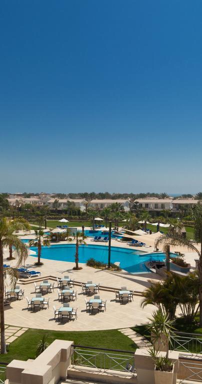 Jaz Little Venice Golf Resort Ain Sukhna Eksteriør billede View of the pool at the Al Hamra Golf Club
